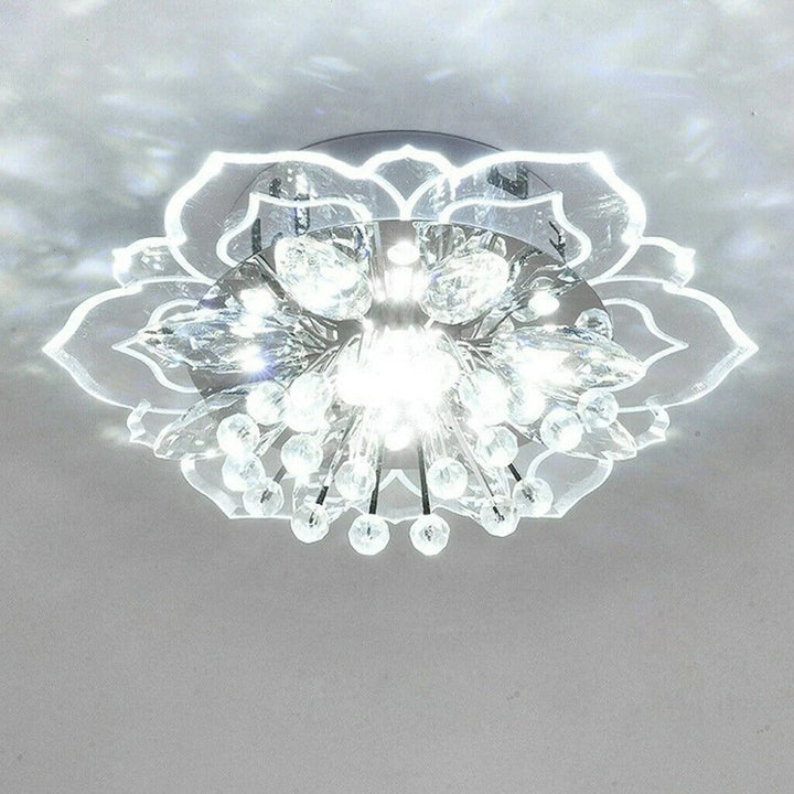 Designerska kryształowa lampa sufitowa LED w kształcie kwiatu, idealna do salonu.