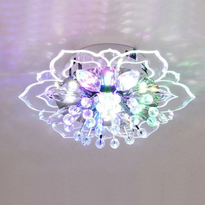 Designerska lampa sufitowa LED kryształowy kwiat, idealna do eleganckiej dekoracji salonu.