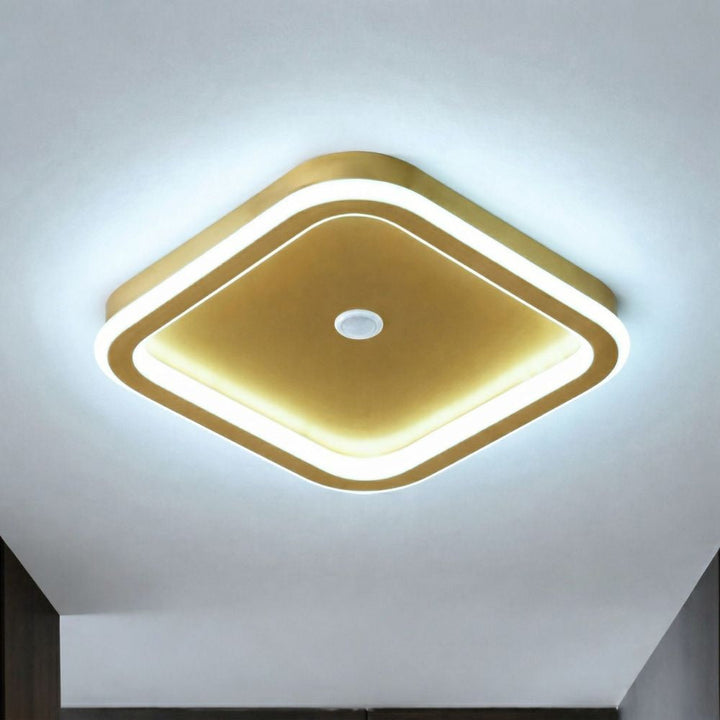 Wielofunkcyjna lampa sufitowa LED z czujnikiem ruchu. Idealna do wnętrz domowych i biurowych.