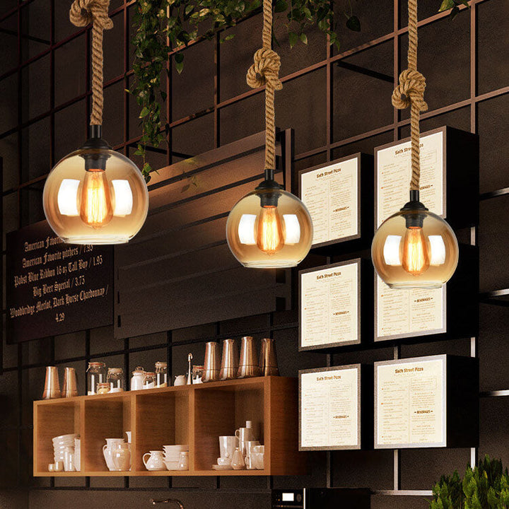 Dekoracyjna lampa wisząca kula, oświetlenie w stylu retro, szklana, do salonu.