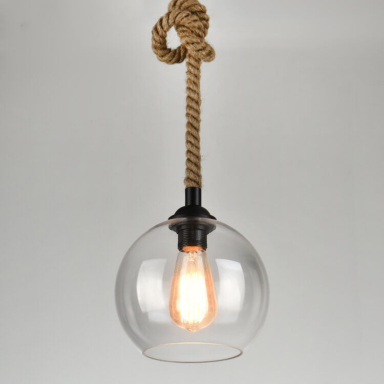 Lampa wisząca kula retro, idealna do oświetlenia salonu lub jadalni.