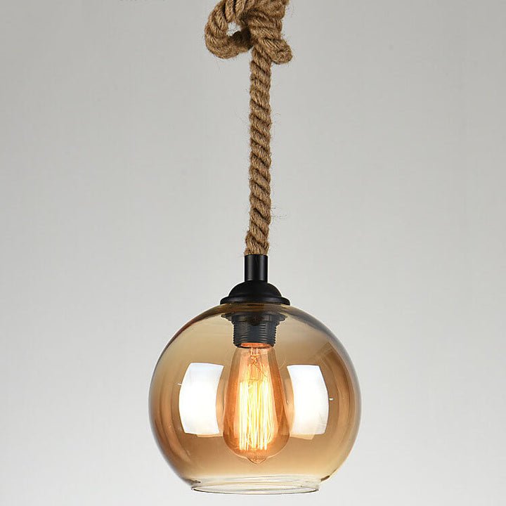 Lampa sufitowa kula ze szkła, design retro, eleganckie oświetlenie.