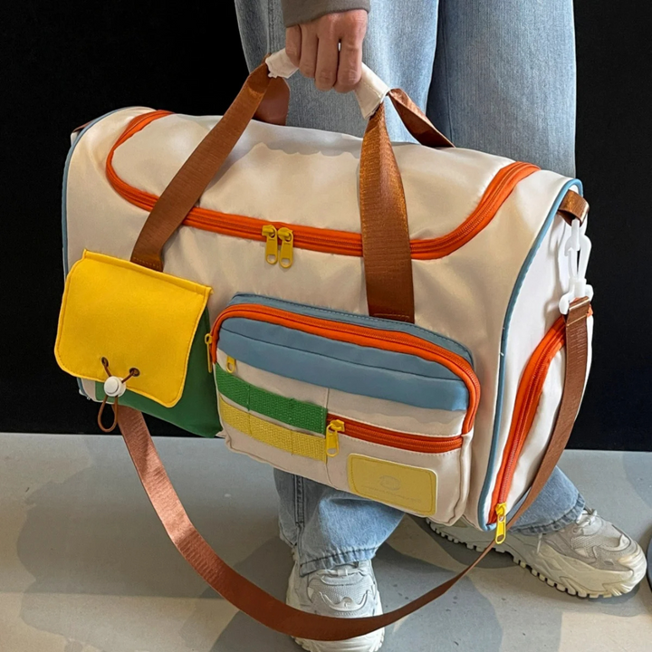 Torba FlexaBag unisex w żywych kolorach: niebieski, żółty i różowy. Wytrzymały nylon na sport i podróże.