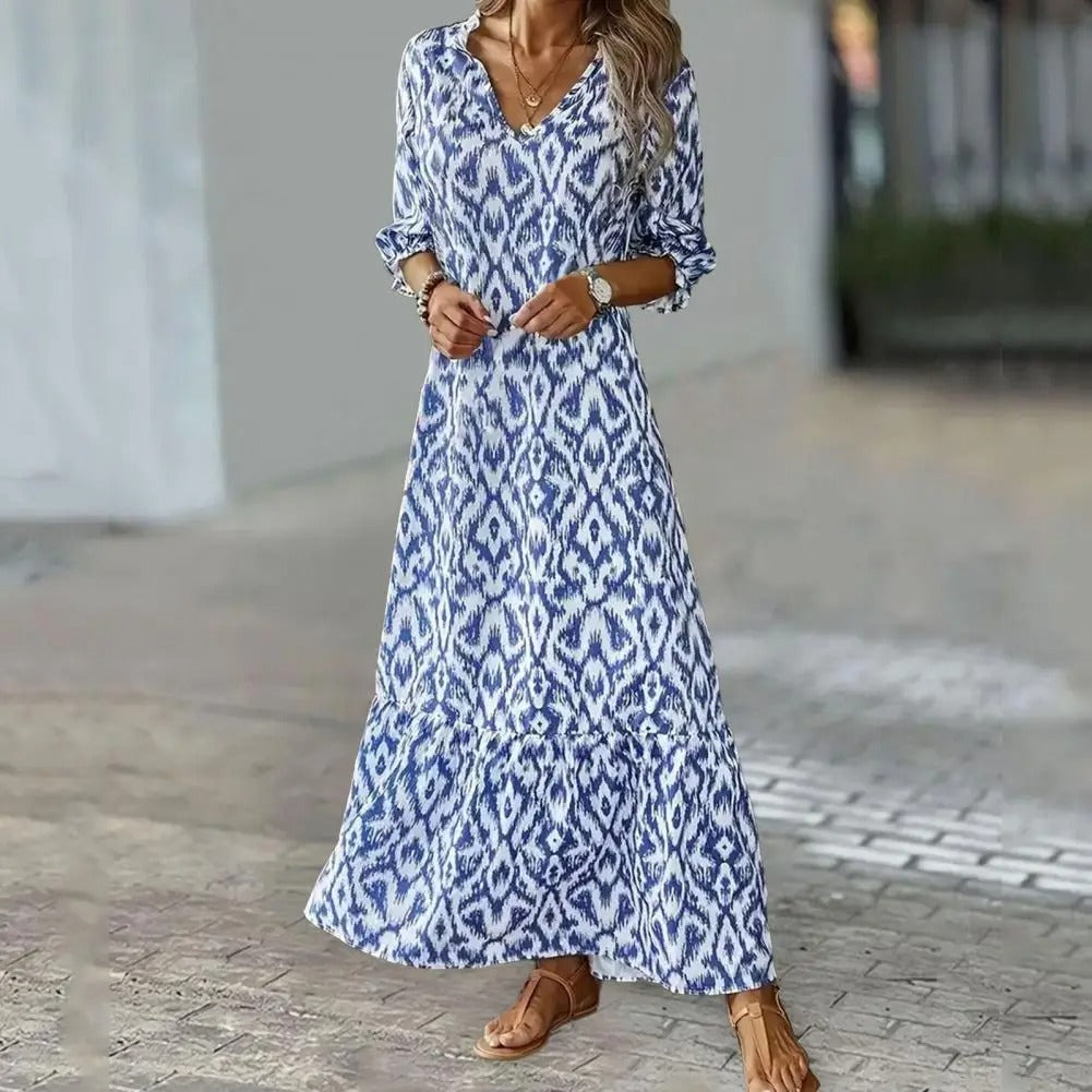 Letnia zwiewna sukienka maxi damska z eleganckim wzorem. Idealna na lato i modne wyjścia.