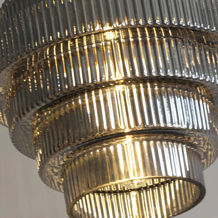 Lampa wisząca butelkowa, luksusowy design, mosiądz vintage, przezroczysty klosz szklany.
