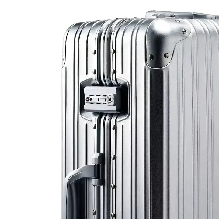 Luksusowa walizka podróżna z aluminium i magnezu. Wytrzymały, twardy bagaż z kółkami 360 i zamkiem TSA.