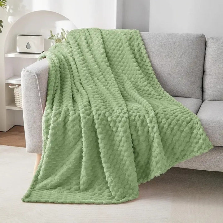 Wysokiej jakości miękki koc na sofę. Elegancki pled, który doda komfortu i stylu Twojemu salonowi.