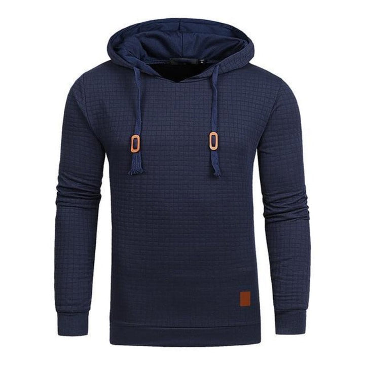 Modna męska bluza z kapturem, nierozpinana, z wytłaczanym wzorem. Wygodna odzież męska na streetwear.