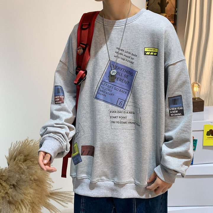 Komfortowa męska bluza nierozpinana z modnym nadrukiem. Idealne ubranie codzienne, podkreślające męski styl streetwear.