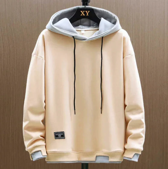 Wygodna męska bluza oversize z kapturem, łącząca modny styl casual z miejskim komfortem.
