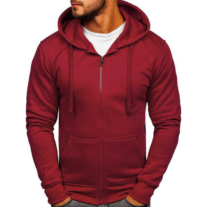 Mężczyzna noszący komfortową bluzę rozpinaną z kapturem. Stylowy look casual, idealny do mody męskiej i streetwear.