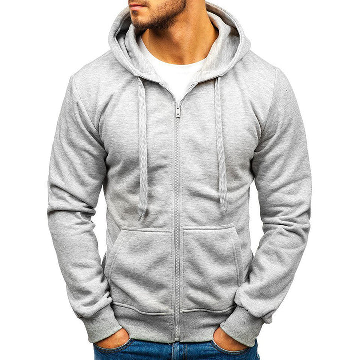 Stylowa męska bluza rozpinana z kapturem w pełnym ujęciu. Komfort i modny design na co dzień, podstawa garderoby.