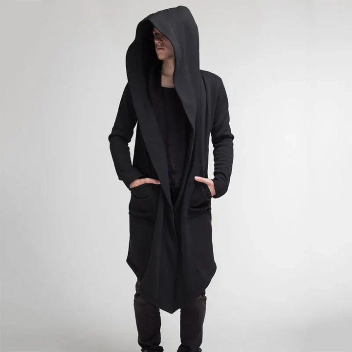 Długa męska bluza z kapturem i funkcjonalnymi kieszeniami. Odzież męska w luźnym, casualowym stylu.