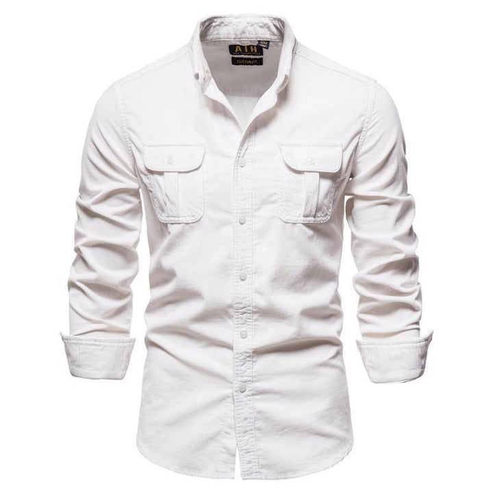 Męska koszula casual w klasycznym kroju, długi rękaw, dwie kieszenie na piersi. Komfort i styl smart casual.