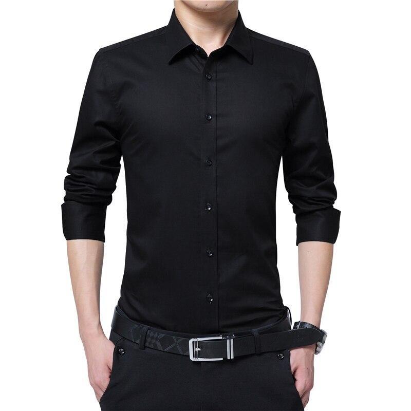 Męska koszula slim fit. Elegancka, dopasowana, idealna do biura i na co dzień. Długi rękaw, jednolity kolor.