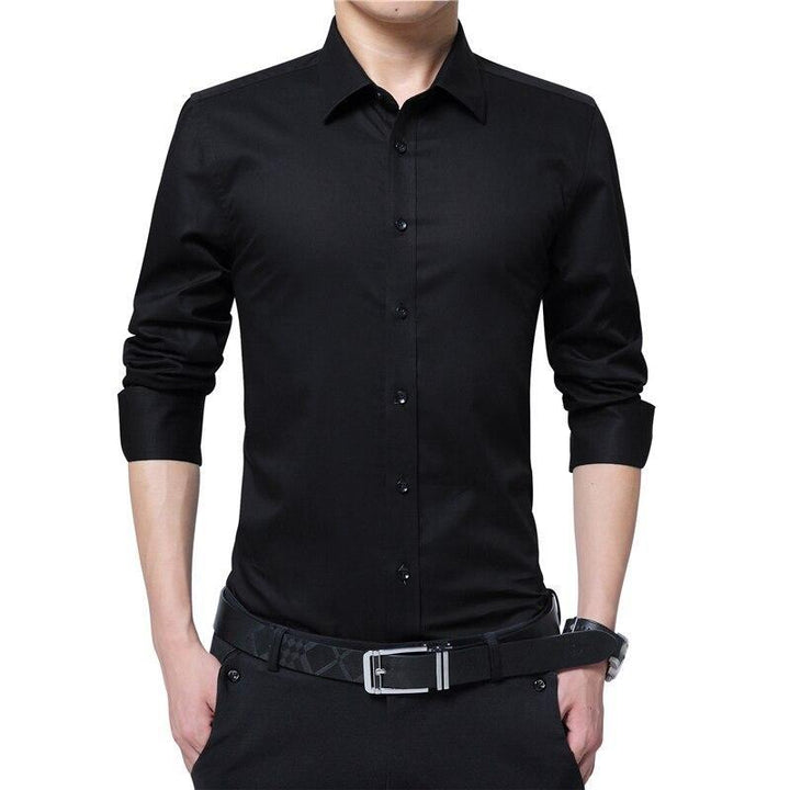 Męska koszula slim fit. Elegancka, dopasowana, idealna do biura i na co dzień. Długi rękaw, jednolity kolor.