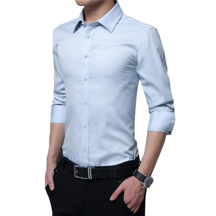 Dopasowana koszula męska slim fit. Elegancki styl casual i biznesowy. Długi rękaw, podkreśla sylwetkę.