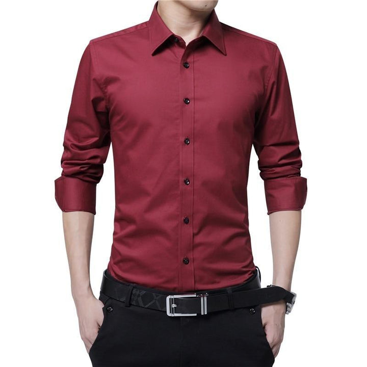Nowoczesna męska koszula slim fit. Dopasowana, elegancka, w jednolitym kolorze. Idealna na wieczorne wyjścia.