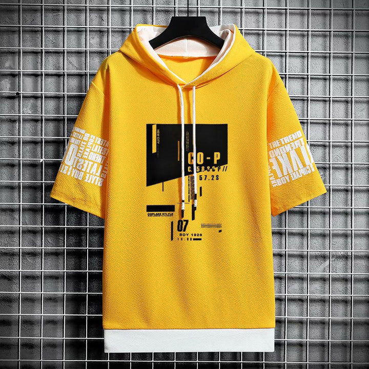 Męska bluza z krótkim rękawem i kapturem. Letni komfort i styl streetwear z oryginalnym nadrukiem graffiti.