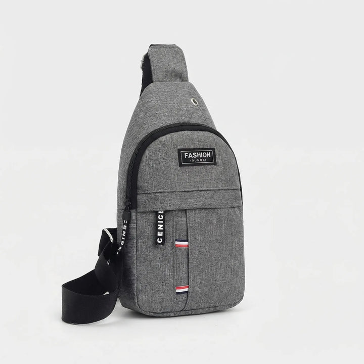 Kompaktowa męska torba crossbody z wieloma przegródkami, wodoodporna, idealna do podróży i aktywności.