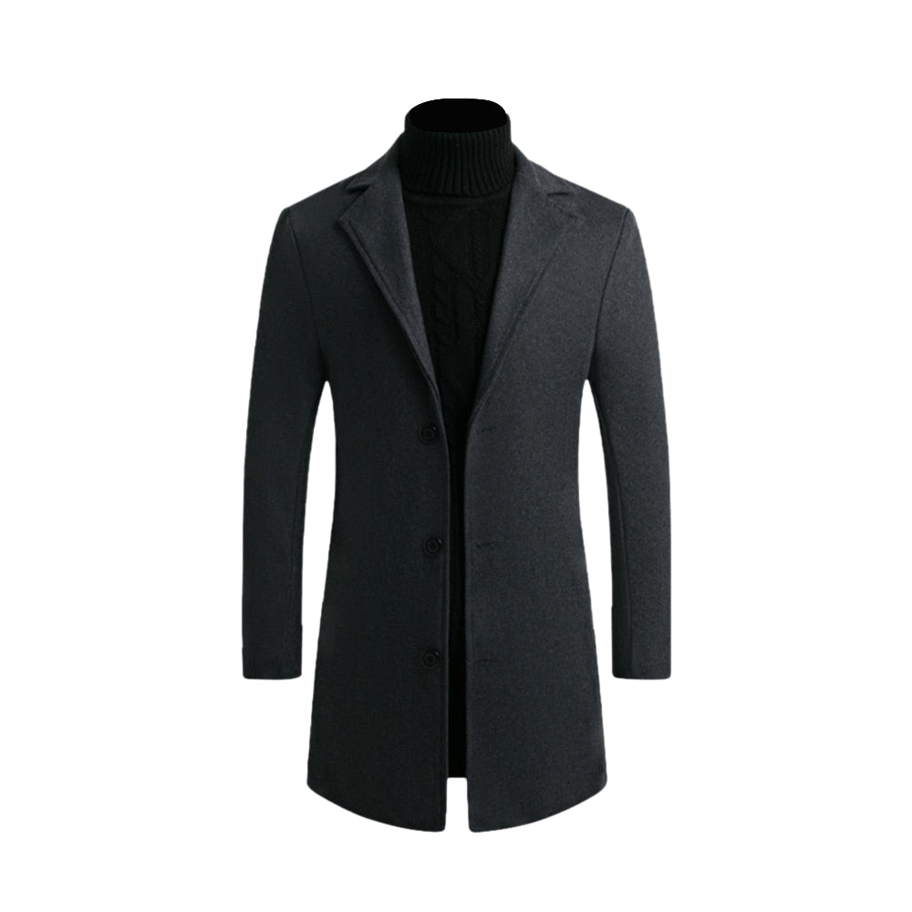 Mężczyzna prezentujący długi, elegancki płaszcz męski slim fit. Moda męska na jesień/zimę.