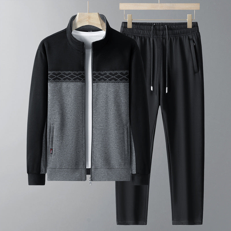 Czarny męski dres sportowy z geometrycznym wzorem, bluza i spodnie. Wygodny komplet do fitnessu i na co dzień.