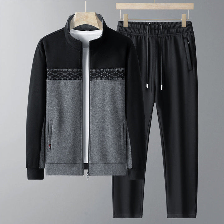 Czarny męski dres sportowy z geometrycznym wzorem, bluza i spodnie. Wygodny komplet do fitnessu i na co dzień.