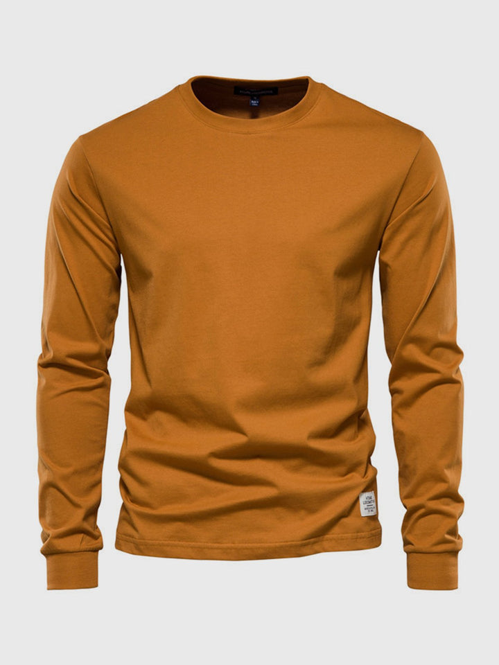Stylowy męski longsleeve, koszulka z długim rękawem zapewniająca wygodę i modny look na co dzień.
