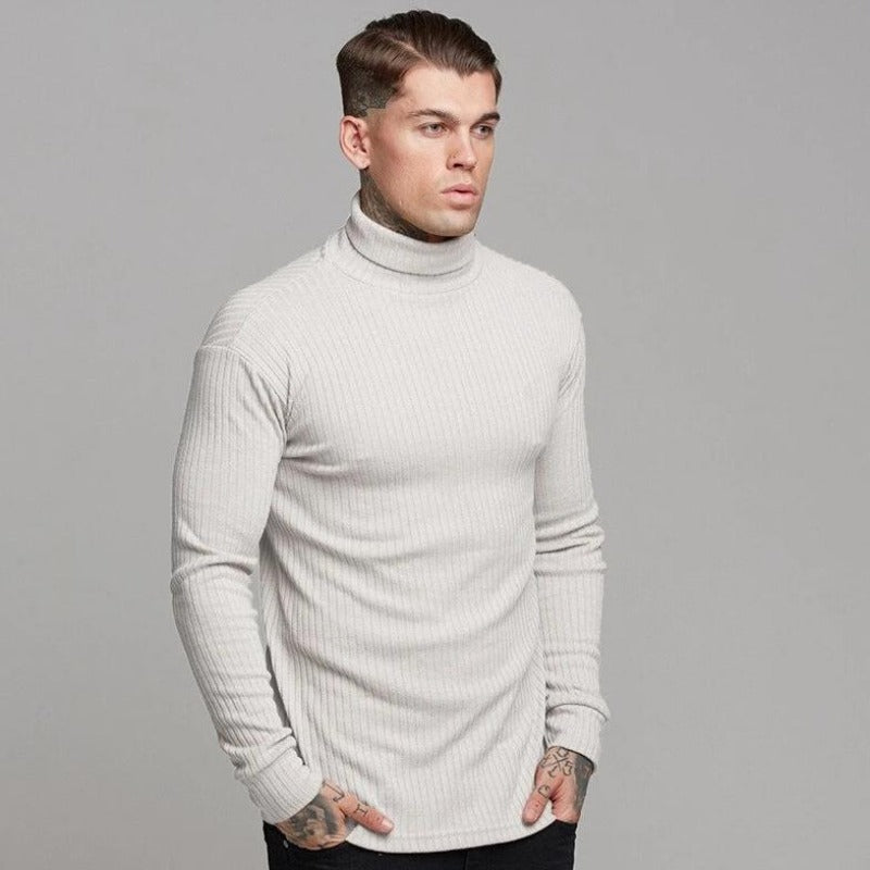 Elegancki męski sweter golf z prążkowanym wzorem. Idealny na chłodne dni, zapewnia ciepło i styl.
