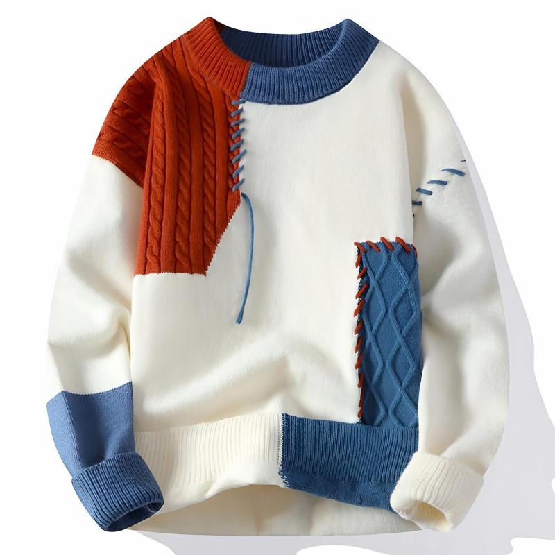 Męski sweter patchworkowy w odcieniach szarości i granatu, idealny na jesień i zimę. Ciepły i stylowy.