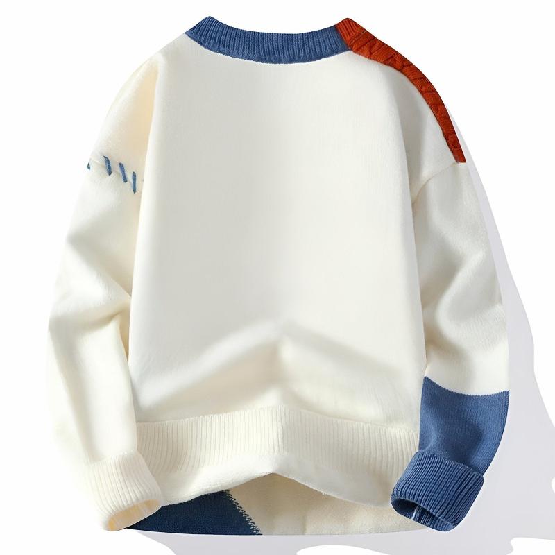 Stylowy męski sweter patchworkowy w modnych kolorach, idealny na zimę i jesień. Zapewnia komfort i ciepło.
