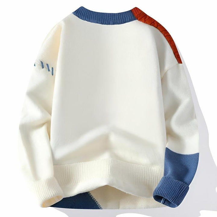 Stylowy męski sweter patchworkowy w modnych kolorach, idealny na zimę i jesień. Zapewnia komfort i ciepło.