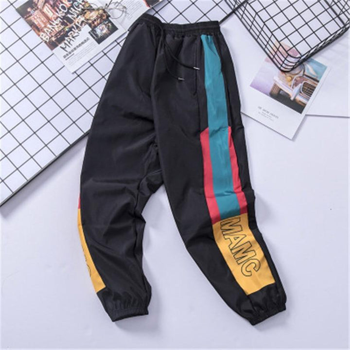 Męskie spodnie cargo z geometrycznym wzorem. Luźny krój dla komfortu w miejskim stylu streetwear.