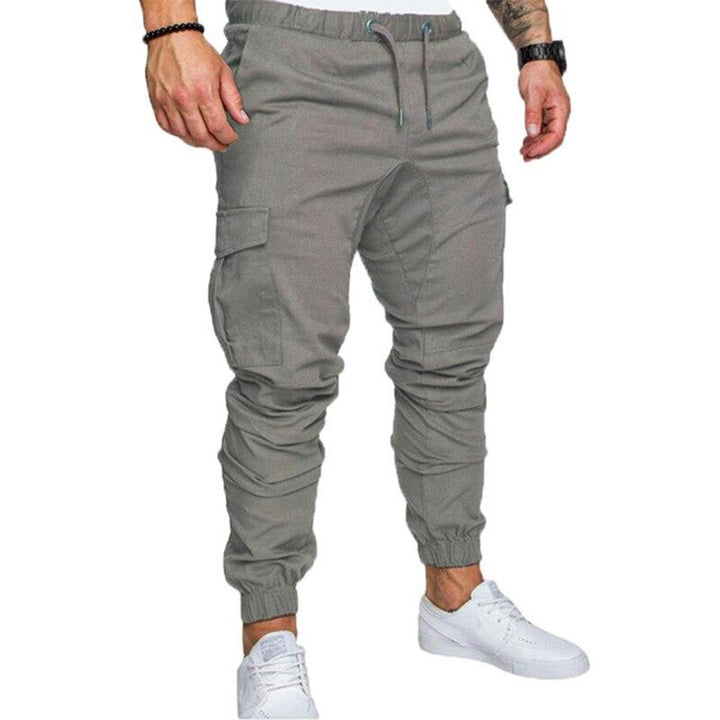 Stylowe bojówki męskie ze ściągaczami, pojemne kieszenie, uniwersalne do swobodnych outfitów.
