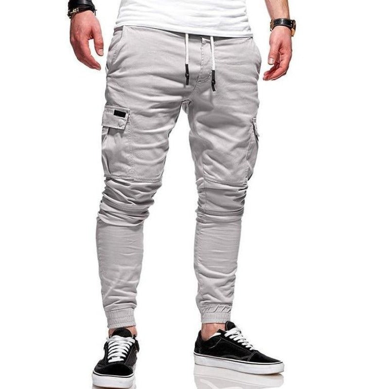 Męskie bojówki dopasowane, idealne do streetwearu. Komfortowe spodnie cargo ze ściągaczami, modny design.