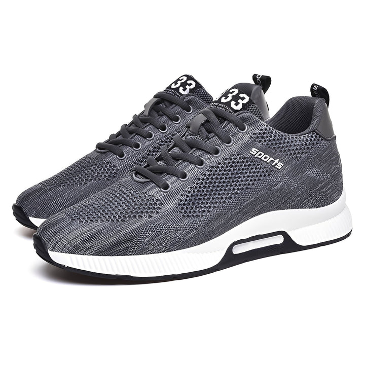 Modne męskie buty sportowe z oddychającą cholewką, zapewniające wygodę i styl na każdą okazję.