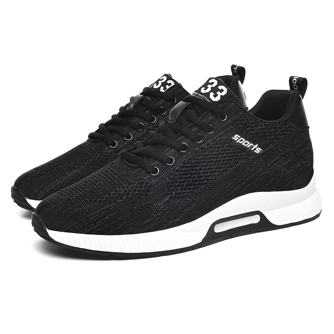 Eleganckie i sportowe męskie buty do biegania, łączące nowoczesny design z funkcjonalnością.