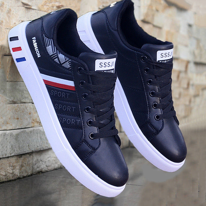 Stylowe męskie buty casual z ozdobnymi paskami, szare. Modne i lekkie obuwie sportowe, idealne na co dzień.