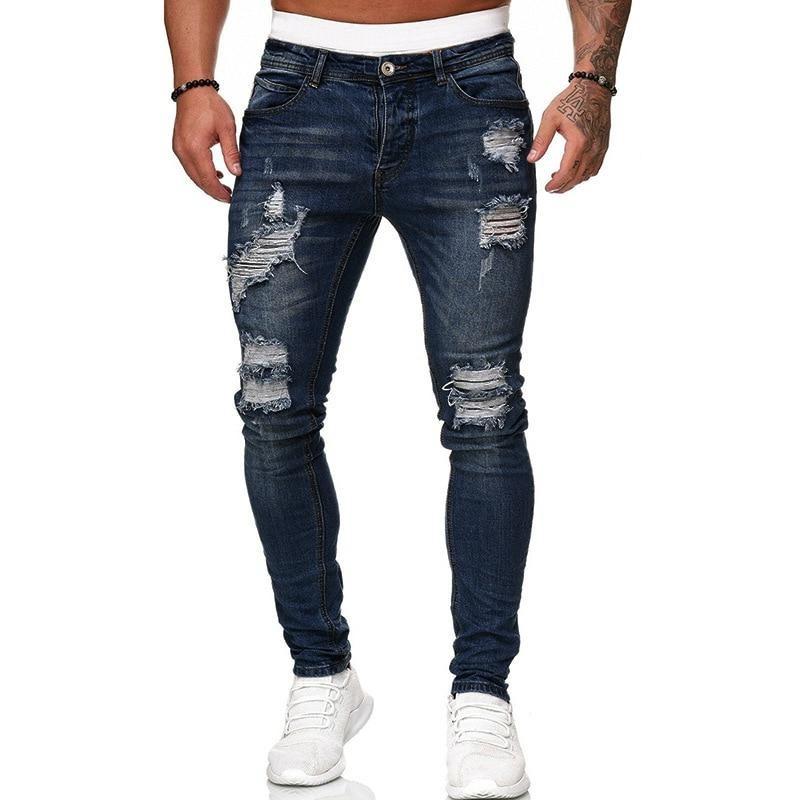 Męskie jeansy slim fit, granatowe, stylowe i wygodne, idealne do casualowych stylizacji miejskich. Modne spodnie męskie.