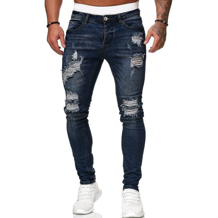 Męskie jeansy slim fit, granatowe, stylowe i wygodne, idealne do casualowych stylizacji miejskich. Modne spodnie męskie.