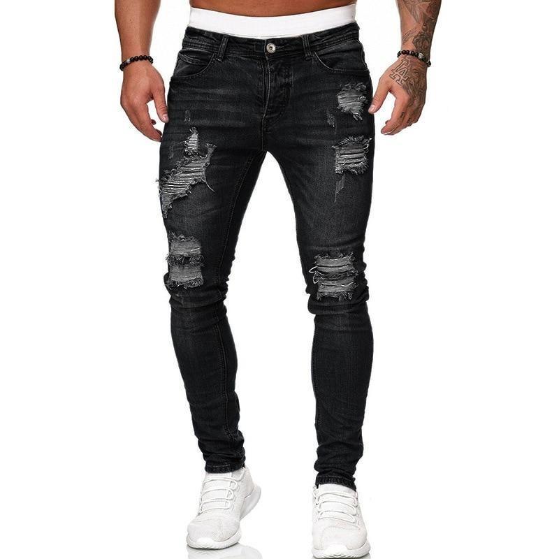 Czarne męskie jeansy slim fit, casualowe spodnie z wygodnej tkaniny. Idealne do miejskich stylizacji. Modne.