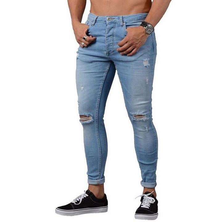 Czarne męskie jeansy slim fit, modne spodnie z wygodnego denimu. Idealne do codziennych i casualowych stylizacji.