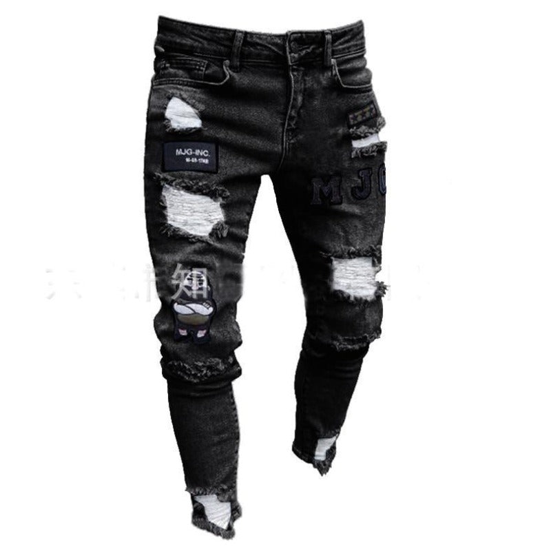 Męskie jeansy slim fit z modnymi przetarciami i stylowymi naszywkami. Wygodne spodnie męskie do casualowych stylizacji.