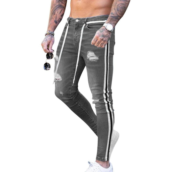Komfortowe męskie jeansy slim fit z modnymi przetarciami. Stylowe spodnie denim, idealne dla mężczyzn ceniących modę.