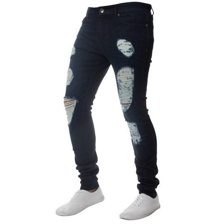 Męskie jeansy slim fit z modnymi przetarciami. Stylowe i wygodne, idealne na co dzień.