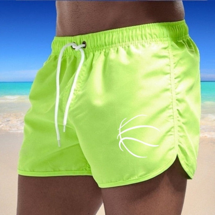 Męskie krótkie szorty sportowe do pływania, idealne na lato, plażę i aktywne spędzanie czasu.