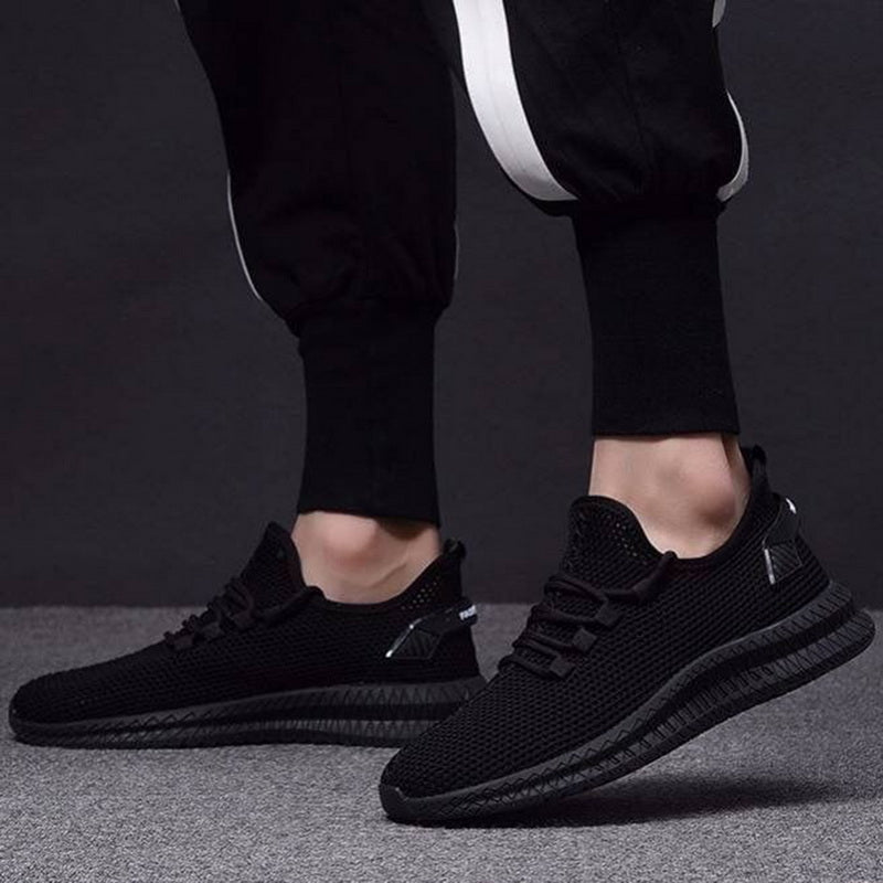 Męskie buty treningowe z amortyzacją, zapewniające wsparcie i wygodę podczas aktywności.