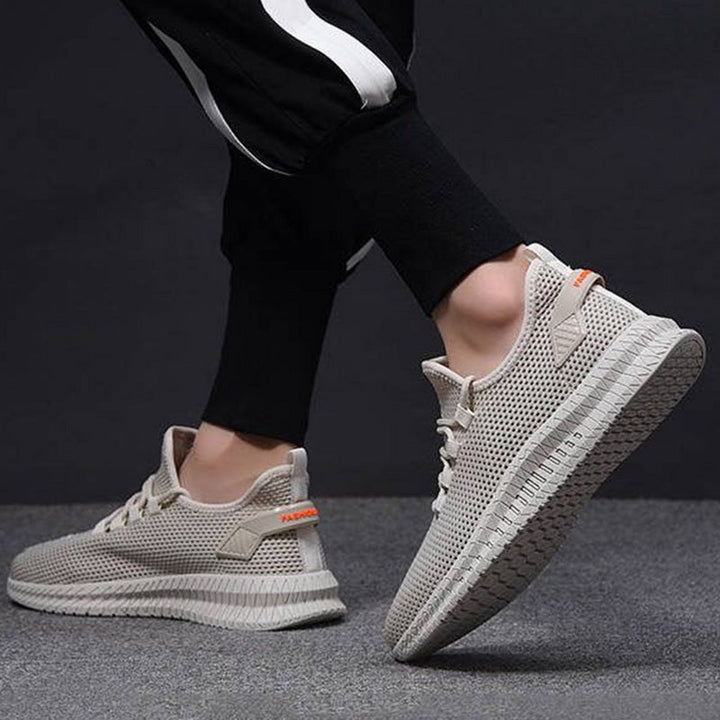 Męskie sneakersy sportowe, oddychające i lekkie, do codziennego komfortu i stylu.