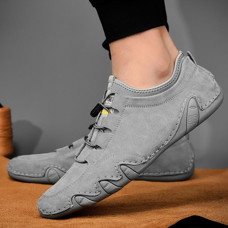 Męskie mokasyny sportowe z amortyzacją, idealne na co dzień. Wygodne casualowe obuwie slip-on.
