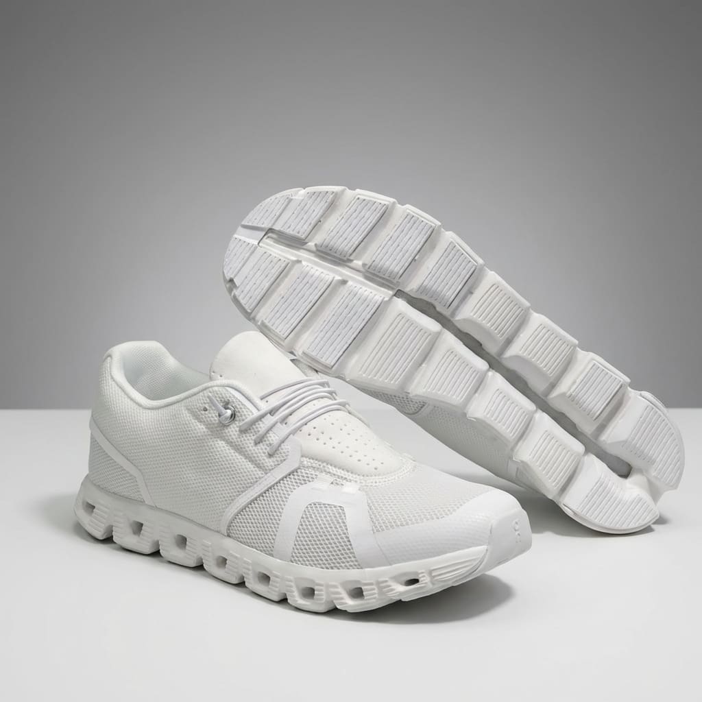 Profil niskich męskich sneakersów, sznurowane, stylowe i wygodne obuwie na aktywność.